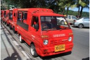 14311812-new-style-red-tuk-tuk-taxi-in-patong-phuket-island