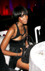 naomi-campbell-cleavage-black-holey-dress-01.jpg