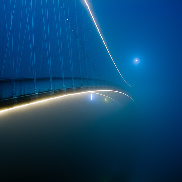 Bridge in fog by oriontrail