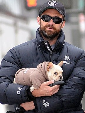 Hugh Jackman carrying his baby