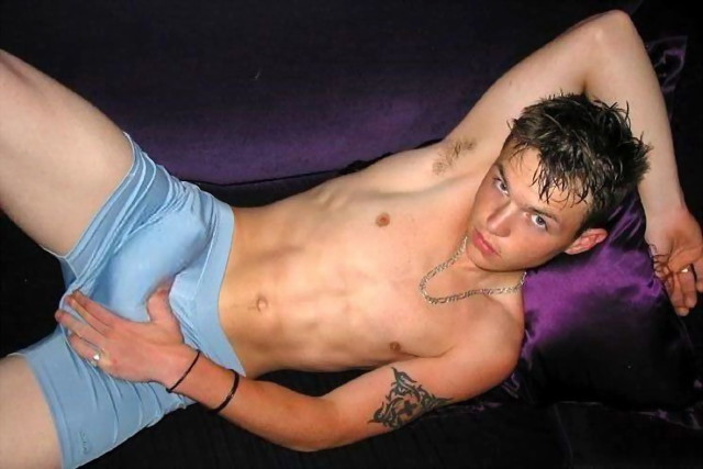 [xave's best gay pics] Athletic shirtless boy lying, showin
